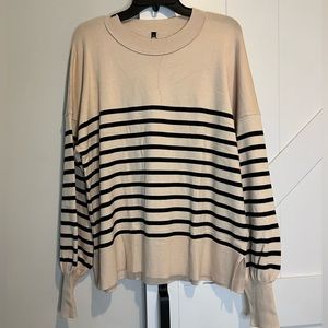 Crewneck beige sweater with black stripes
